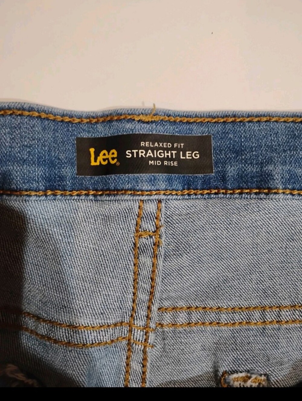 Lee Women's Relaxed Fit Straight Leg Mid Rise Jeans in Light Blue